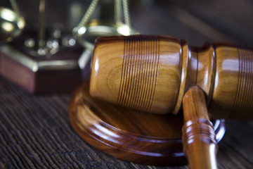 Law theme, mallet of judge, wooden gavel 