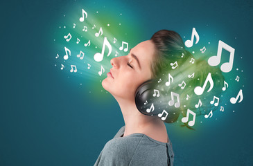 Young woman with headphones listening to music