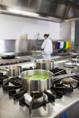 Several pots cooking on hotplate