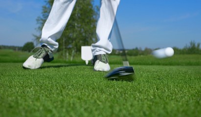 Golf, driver hitting a golf ball