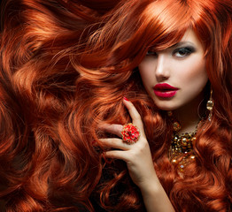 Long Curly Red Hair. Fashion Woman Portrait