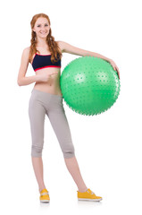 Fototapeta premium Woman exercising with swiss ball on white