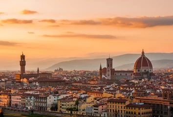 Schilderijen op glas Golden sunset over Florence, Italy © gurgenb