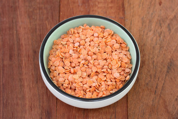lentil in dish on dark background