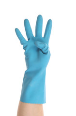 Obraz premium Blue glove on hand shows four.