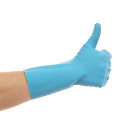Blue glove for cleaning show thumbs up.