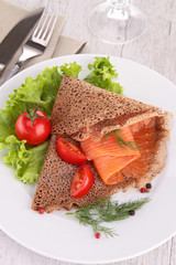 plate of crepe with salmon