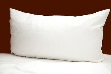 Pillow in bed - obrazy, fototapety, plakaty