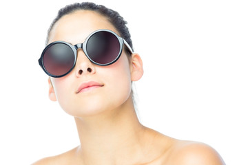 Young woman wearing big sunglasses