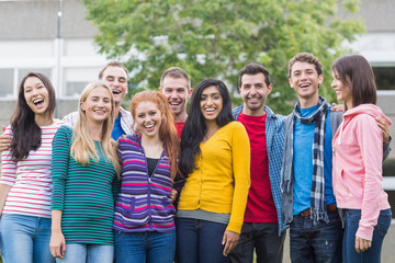 Fototapeta na wymiar Group portrait of college students in park