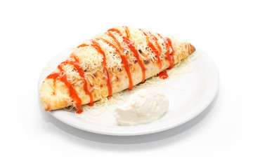 Pirogue with tomato sauce and cheese on the plate