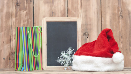 Obraz na płótnie Canvas Christmas decoration with blank blackboard for your text and ann