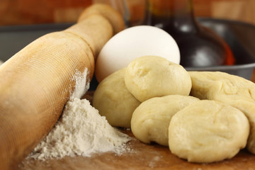 Flour dough with rolling pin