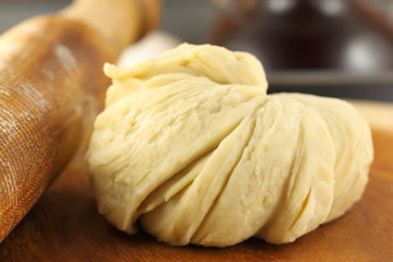 Flour dough with rolling pin