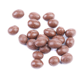 Dark brown dragee in chocolate covered