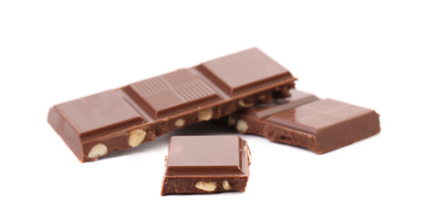 Morsels of milk chocolate with nuts