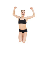 Strong slim model jumping in the air