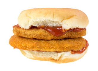 Veal patties sandwich with ketchup on a white background