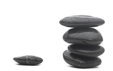Balanced stack of stones isolated on white. Zen design concept