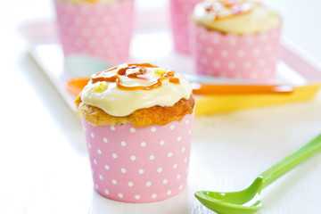 Cupcake with creamy butter on top