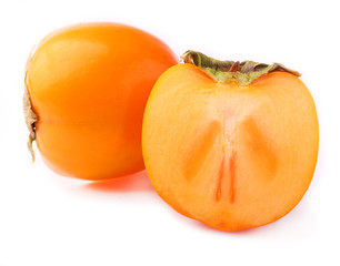 ripe persimmon on a white