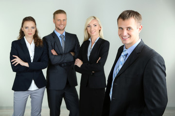 Group of business people on gray background