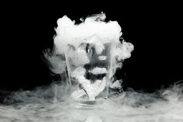 glass of water with ice vapor