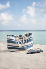 beach bag and flip flops