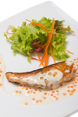 Grilled salmon in a creamy caviar sauce