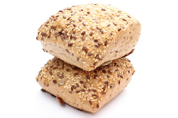Fresh wholemeal rolls isolated on white background