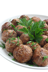 Fried pork meatballs on a plate