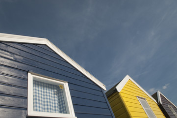 Blue and yellow beach huts