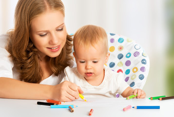 Mother and baby draw color pencil