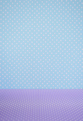 Polka dots pattern for blue wall and purple floor