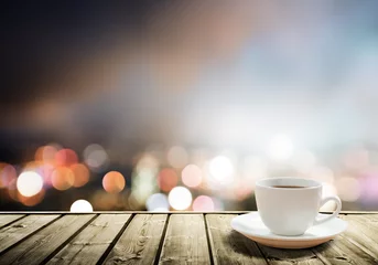 Tuinposter coffee on table in the night city © Iakov Kalinin