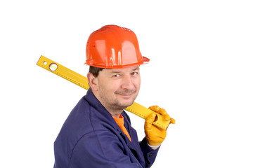 Worker in hard hat holding ruler