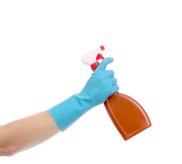 Hand holding brown plastic spray bottle