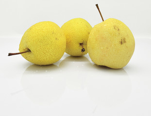 Three pears on the white background