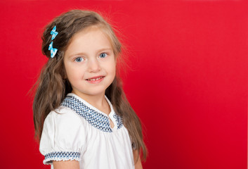smiling girl portrait on red