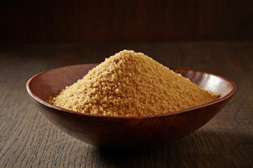 brown sugar in a wooden bowl