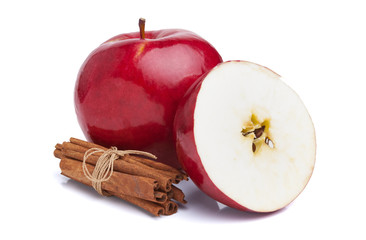 Apples and cinnamon on white background