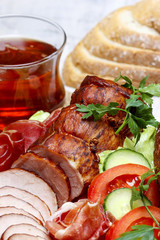 Sliced sausage on wooden table