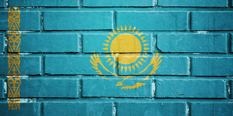 Kazahstan flag on brick wall