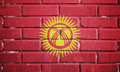 Kyrgyzstan flag on brick wall