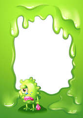 A border design with a green monster in tears