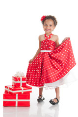 Little beautiful girl with gifts.