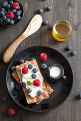 crisp bread with creme fraiche and berries