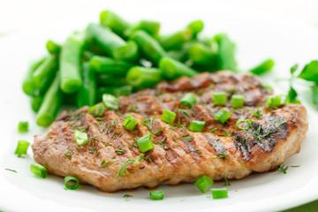 Beef steak with green beans