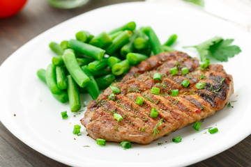 Beef steak with green beans