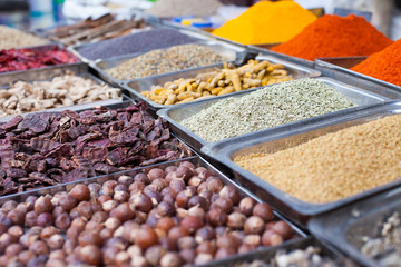 Indian colored spices at local market in Goa, India